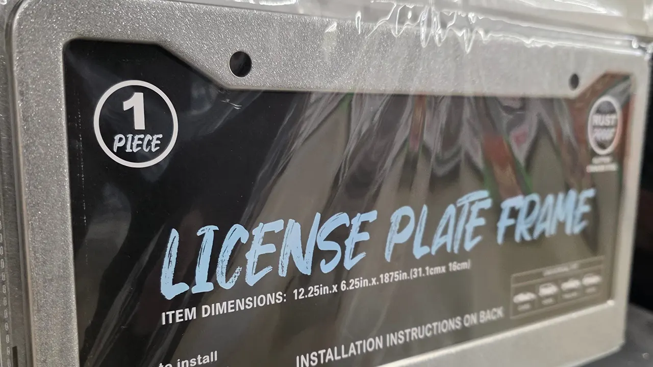 massachusetts license plate frame law