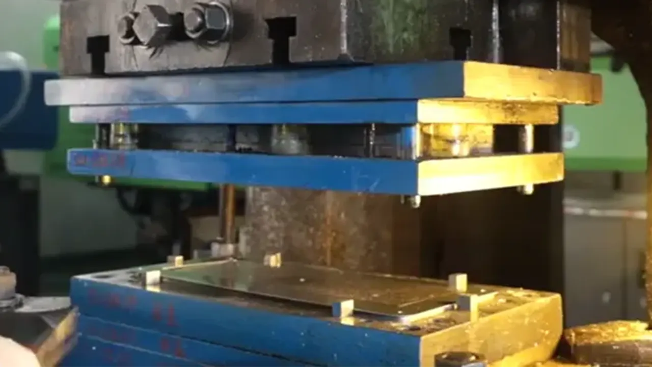 how metal license plate frames are stamped